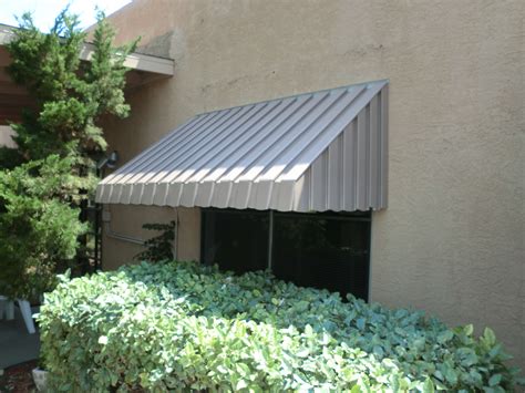 metal awnings for santa fe style house|rader awning santa fe.